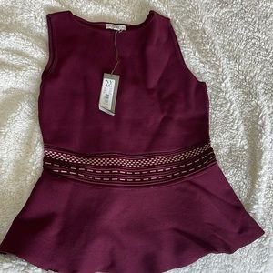 Sleeveless peplum blouse